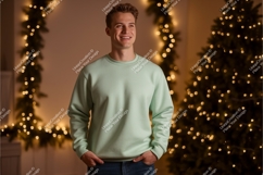 Man wearing mint green sweatshirt festive lights Product Image 1