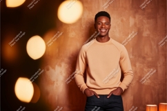 Man wearing peach sweatshirt and black jeans image Product Image 1