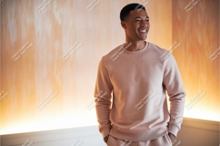Man wearing light pink sweatshirt smiling Product Image 1