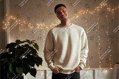 Man wearing cream sweatshirt indoors casual Product Image 1