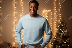 Man wearing light blue sweatshirt with festive lights Product Image 1