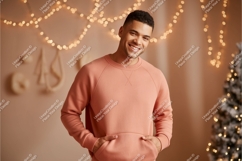 Man wearing peach crewneck sweatshirt mockup image Product Image 1