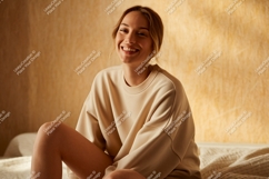 Young woman smiling wearing beige sweatshirt casual Product Image 1