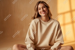 Woman wearing cream sweatshirt casual fashion Product Image 1