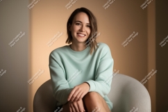 Woman wearing light blue sweatshirt sitting Product Image 1