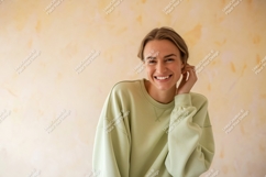 Young Woman Smiling Wearing Green Sweatshirt happy Product Image 1