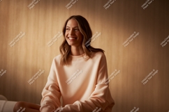 Smiling woman wearing peach sweatshirt casual Product Image 1