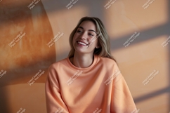 Woman wearing peach sweatshirt casual mockup Product Image 1