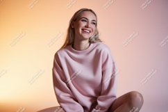 Smiling woman wearing pink sweatshirt casual Product Image 1