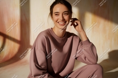 Woman wearing mauve sweatshirt and pants casual Product Image 1