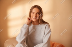 Smiling woman wearing grey sweatshirt casual Product Image 1