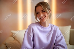 Young woman smiling wearing purple sweatshirt casual Product Image 1