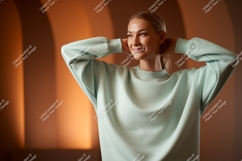 Woman wearing light blue sweatshirt fashion Product Image 1