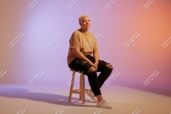 Person sitting on stool shirt Product Image 1
