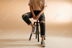 Man wearing ripped jeans and sneakers stool Product Image 1