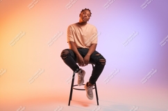 Person sitting on stool fashion casual Product Image 1