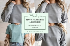 Model wearing light blue t-shirt and grey sweatshirt mockup Product Image 1