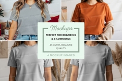 T-shirt mockup featuring two models wearing light blue and o Product Image 1