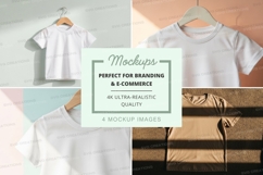 T-shirt mockup - white crew neck t-shirts on hangers Product Image 1