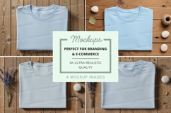 Folded light blue t-shirts on wooden background Product Image 1