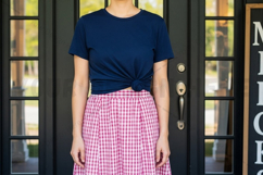 Casual navy blue t-shirt with plaid skirt mockup design Product Image 1
