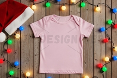 Holiday themed baby pink t-shirt mockup Product Image 1