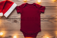 Christmas-themed baby onesie t-shirt mockup Product Image 1