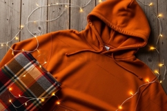 Cozy orange hoodie with plaid scarf t-shirt mockup Product Image 1