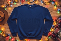 Christmas-themed blue t-shirt mockup Product Image 1