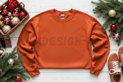 Christmas-themed orange cropped sweatshirt mockup design Product Image 1