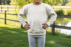 Casual white sweatshirt in outdoor setting t-shirt mockup Product Image 1