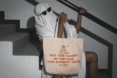 <img src="mockup-featuring-a-woman-in-a-blanket-ghost-costume-holding-a-tote-bag.png" alt="mockup featuring a woman in a blanket ghost costume holding a tote bag"> 