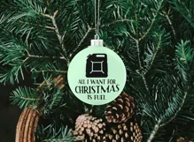 mockup-of-a-christmas-ball-hanging-in-a-minimalistic-scenery and quote - All I want for Christmas is Fuel