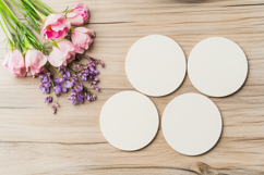 Four Blank Round Coasters Mockup with Cup and Flowers Product Image 1
