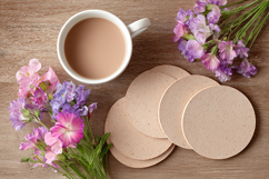 Four Blank Round Coasters Mockup with Cup and Flowers Product Image 1