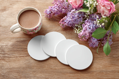 Four Blank Round Coasters Mockup with Cup and Flowers Product Image 1