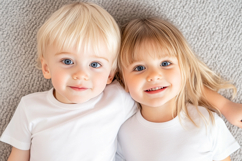 Photorealistic Kids T-Shirt Mockup with Two Children Product Image 1