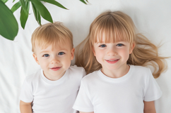Photorealistic Kids T-Shirt Mockup with Two Children Product Image 1