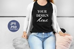 Black t-shirt woman on a couch Mockup PSD, Mockup PSD & JPG Product Image 1