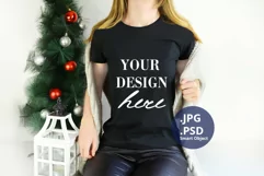 Black Christmas T-shirt Mockup On Young Woman, PSD Mockup Product Image 1