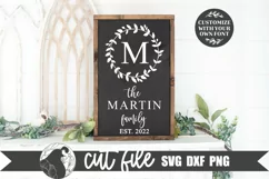 Monogram Wreath Family Name SVG shown on a black farmhouse sign