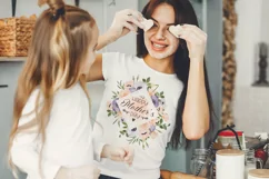 Happy Mothers Day quote in spring florals frame design on a white women t-shirt mockup 