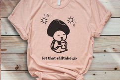 let that shiitake go design on a light pink tshirt