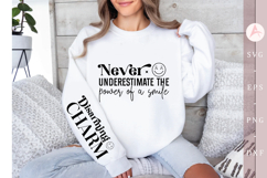 Never underestimate the power of a smile Sleeve SVG Design Product Image 3