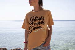 Ocean-inspired quote design with script text and wave sun graphic. Coastal theme artwork perfect for apparel, decals, and beach decor projects.