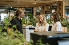 Diverse office team collaborates happily, modern workplace, Product Image 1
