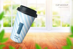 Paper cup mockup on in room with big window in the background