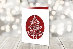 papercut card on table with bokeh lights