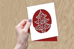 papercut christmas card in hand