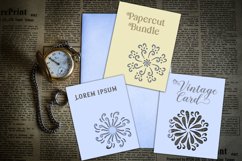 papercut mandala cards on vintage paper with potion with pocket watch